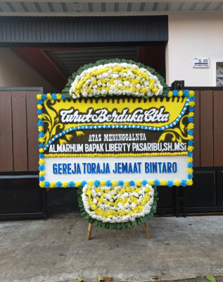 Papan Bunga Duka di Kebawetan